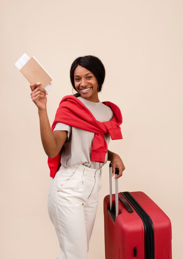 smiley-woman-with-red-baggage-medium-shot